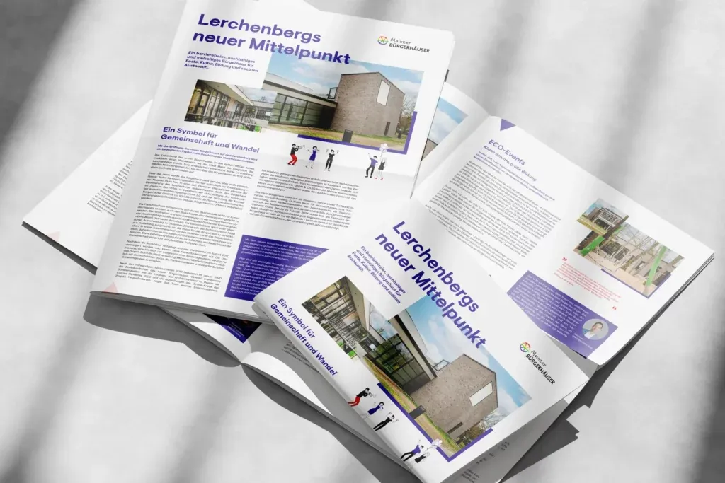 Zwei aufgeschlagene Magazine zeigen Artikel über das barrierefreie Bürgerhaus Mainz-Lerchenberg mit Fotos des Gebäudes und Texten zu Gemeinschaft und ECO-Events.